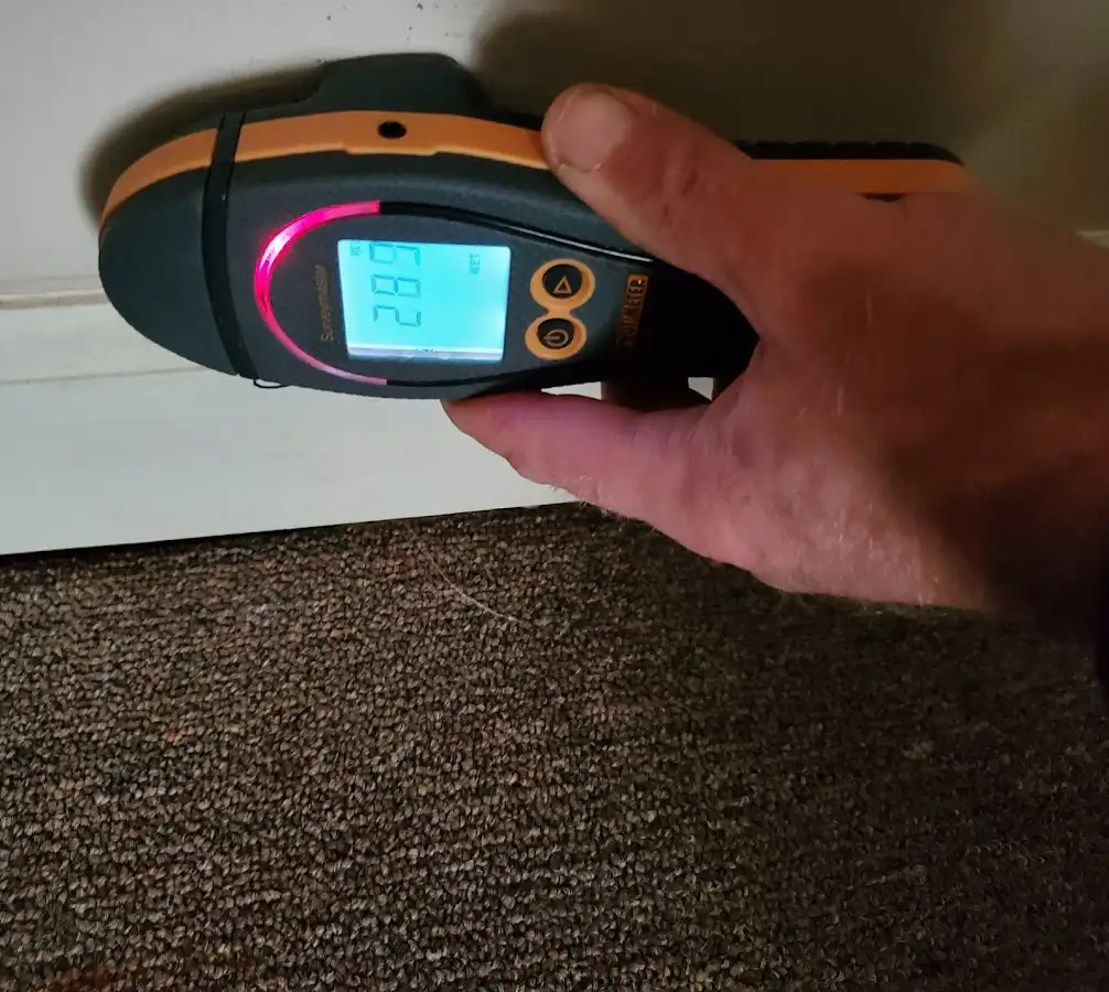 Moisture detection at baseboard during Storm Damage Restoration in Tehachapi